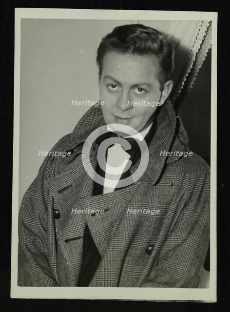 Portrait of American singer, musician and actor Mel Torme, c1950s. Artist: Denis Williams