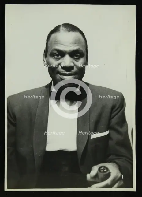 Portrait of American pianist Earl 'Fatha' Hines, 1950s. Creator: Denis Williams.