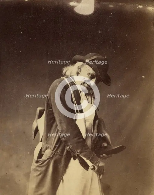 Portrait of an Elderly Man in Hat Holding Some Tools, about 1863-1864. Creator: Oscar Gustav Rejlander.