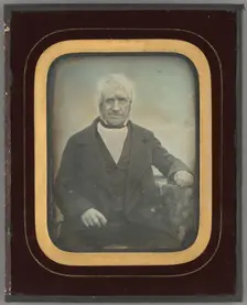 Portrait of an elderly man with white hair and muttonchop whiskers, about 1845. Creator: Unknown