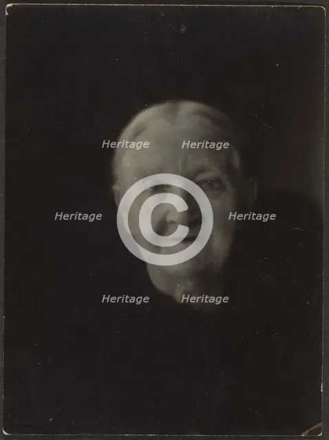 Portrait of an Old Woman in Dark Setting, 1907-1943. Creator: Louis Fleckenstein.