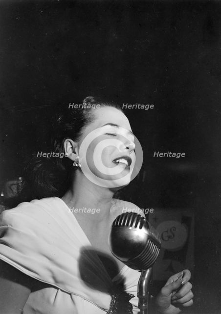 Portrait of Ann Hathaway, Café Society (Downtown), New York, N.Y., 1946. Creator: William Paul Gottlieb.