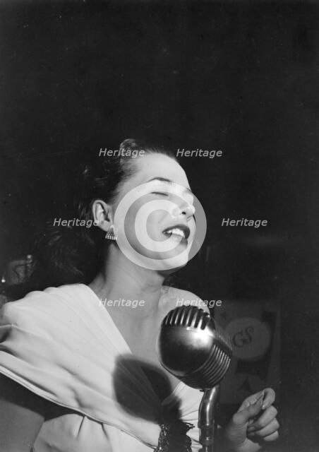 Portrait of Ann Hathaway, Café Society (Downtown), New York, N.Y., 1946. Creator: William Paul Gottlieb.
