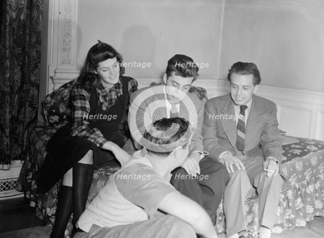 Portrait of Adele Girard, Joe Marsala, Nesuhi Ertegun, and William P. Gottlieb...Washington, ca1940. Creator: Delia Potofsky Gottlieb.