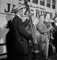 Portrait of Albert Nicholas and Rudi Blesh, Riverboat on the Hudson, N.Y., ca. July 1947. Creator: William Paul Gottlieb