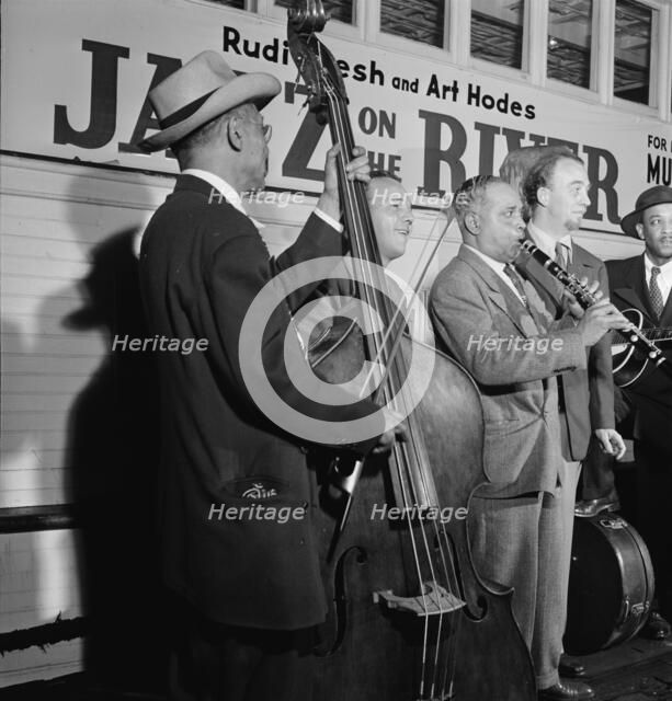 Portrait of Albert Nicholas and Rudi Blesh, Riverboat on the Hudson, N.Y., ca. July 1947. Creator: William Paul Gottlieb.