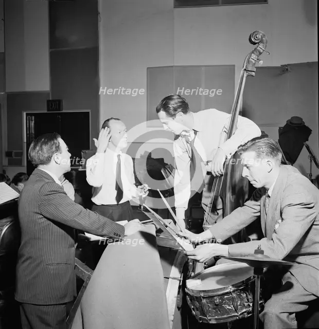 Portrait of Bob Haggart, Morey Feld, and Mack Shopnick, New York, N.Y.(?), ca. July 1947. Creator: William Paul Gottlieb.