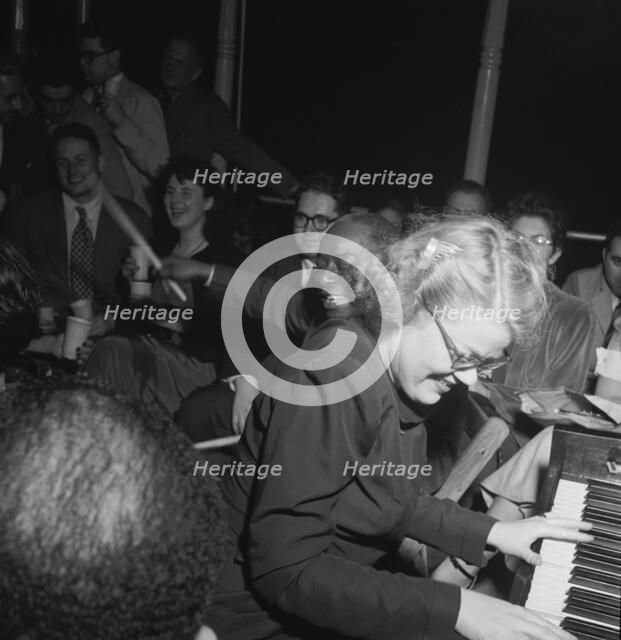 Portrait of Baby Dodds and Bunty Pendelton, Riverboat on the Hudson, N.Y., ca. July 1947. Creator: William Paul Gottlieb.