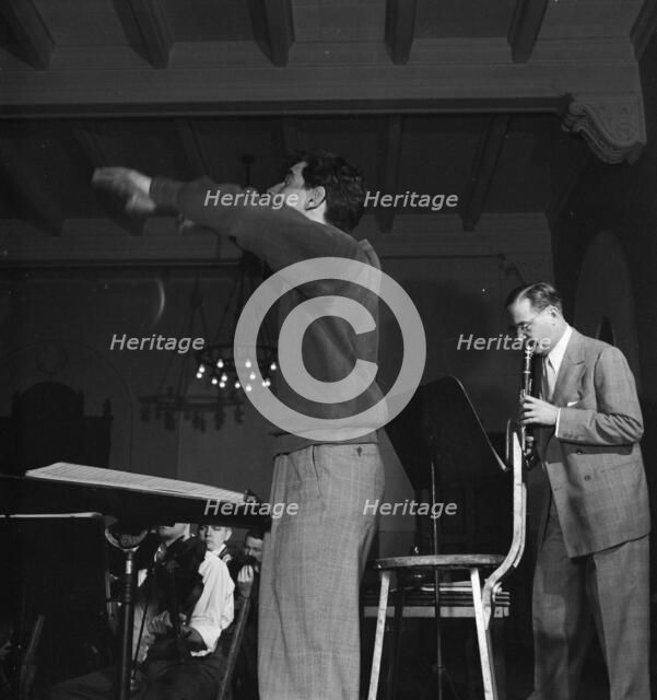 Portrait of Benny Goodman, Leonard Bernstein, and Max Hollander, Carnegie Hall, New York, 1946. Creator: William Paul Gottlieb.