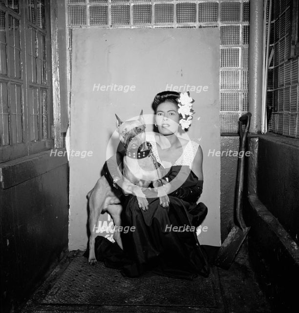 Portrait of Billie Holiday and Mister, Downbeat, New York, N.Y., ca. Feb. 1947. Creator: William Paul Gottlieb.