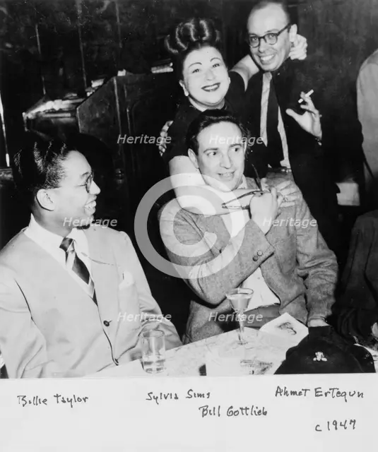 Portrait of Billy Taylor, Sylvia Syms, William P. Gottlieb, and Ahmet M. Ertegun, N.Y., ca. 1947. Creator: Delia Potofsky Gottlieb.