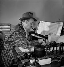 Portrait of Brick Fleagle in his home, New York, N.Y., 1946. Creator: William Paul Gottlieb