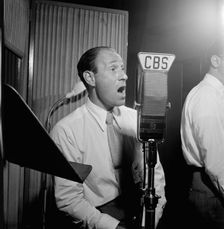 Portrait of Buddy Clark, CBS studio, New York, N.Y., 1946. Creator: William Paul Gottlieb
