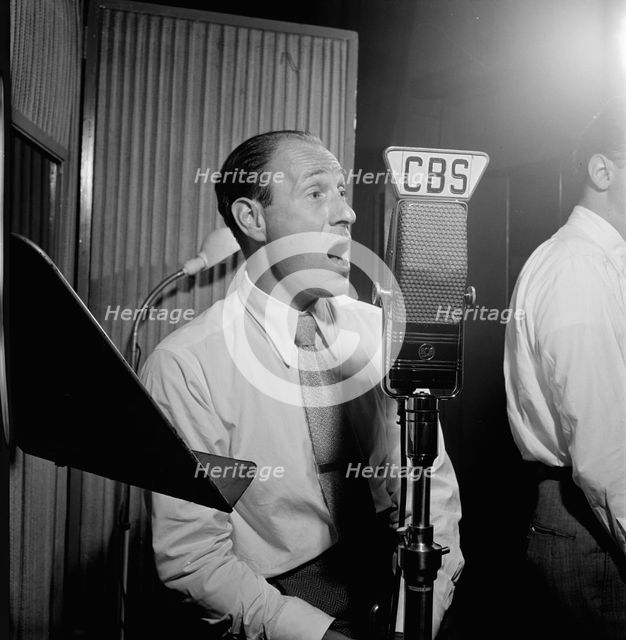 Portrait of Buddy Clark, CBS studio, New York, N.Y., 1946. Creator: William Paul Gottlieb.