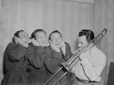 Portrait of Buddy Morrow and Ritz Brothers, New York, N.Y., ca. May 1947. Creator: William Paul Gottlieb