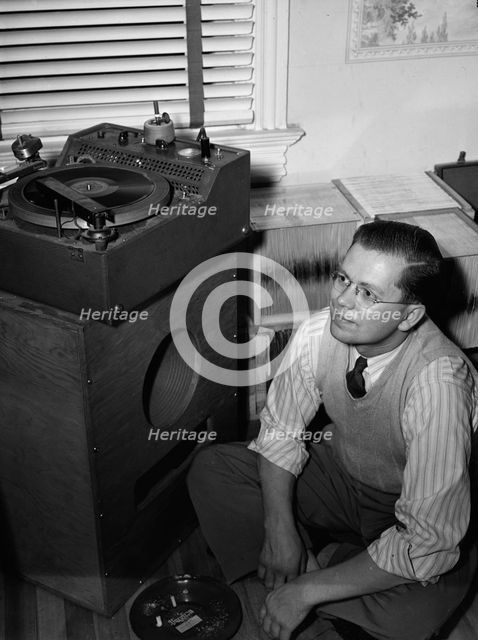 Portrait of Gordon Gullickson in his shop, 1100 25th Street NW, Washington, D.C., ca. Dec. 1941. Creator: William Paul Gottlieb.