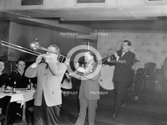 Portrait of George Brunis and Tony Parenti, Jimmy Ryan's (Club), New York, N.Y., ca. Aug. 1946. Creator: William Paul Gottlieb.