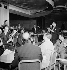 Portrait of Guy Lombardo and Don Rodney, Starlight Roof, Waldorf-Astoria, New York, ca. July 1947. Creator: William Paul Gottlieb