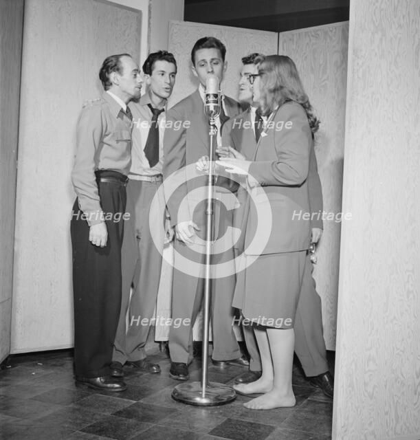 Portrait of Dave Lambert, Jerry Duane, Wayne Howard, Jerry Packer, and Margaret Dale, N.Y., 1947. Creator: William Paul Gottlieb.