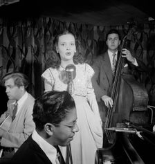 Portrait of Deryk Sampson, Lynn Carver, Justin Arndt, and Clair Dorward, Famous Door, N.Y., 1947. Creator: William Paul Gottlieb