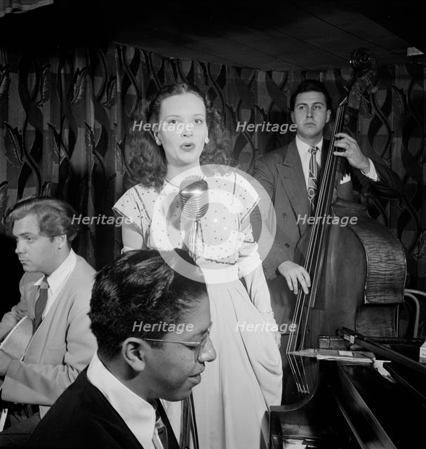 Portrait of Deryk Sampson, Lynn Carver, Justin Arndt, and Clair Dorward, Famous Door, N.Y., 1947. Creator: William Paul Gottlieb.