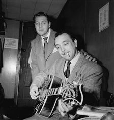 Portrait of Django Reinhardt and David Rose, Aquarium, New York, N.Y., ca. Nov. 1946. Creator: William Paul Gottlieb
