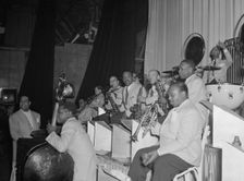 Portrait of Duke Ellington, Junior Raglin, Tricky..., Howard Theater(?), Washington, D.C., 1938. Creator: William Paul Gottlieb
