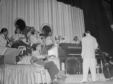 Portrait of Duke Ellington, Junior Raglin, Juan Tizol...Howard Theater(?), Washington, D.C., 1938. Creator: William Paul Gottlieb