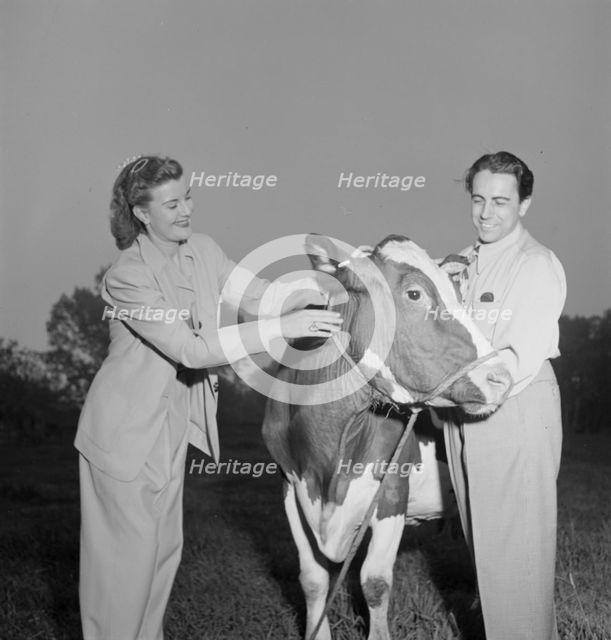 Portrait of Enric Madriguera and Patricia Gilmore on their farm, Connecticut, ca. June 1947. Creator: William Paul Gottlieb.