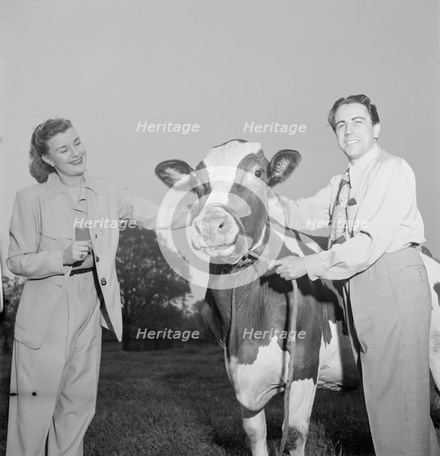 Portrait of Enric Madriguera and Patricia Gilmore on their farm, Connecticut, ca. June 1947. Creator: William Paul Gottlieb.