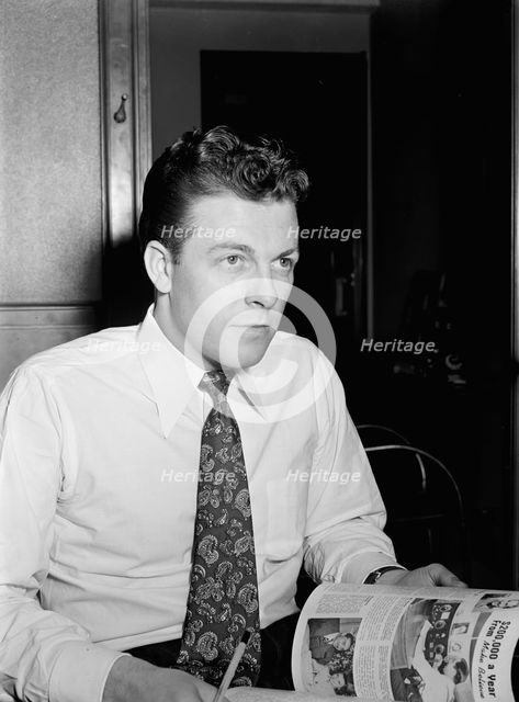 Portrait of Eddie Ronan, Down Beat office, New York, N.Y., 1946. Creator: William Paul Gottlieb.
