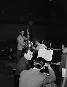 Portrait of Eddy Duchin, Wesley Prince, Nat King Cole, and Oscar Moore, New York, ca. July 1946. Creator: William Paul Gottlieb