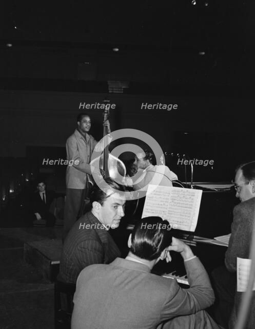 Portrait of Eddy Duchin, Wesley Prince, Nat King Cole, and Oscar Moore, New York, ca. July 1946. Creator: William Paul Gottlieb.