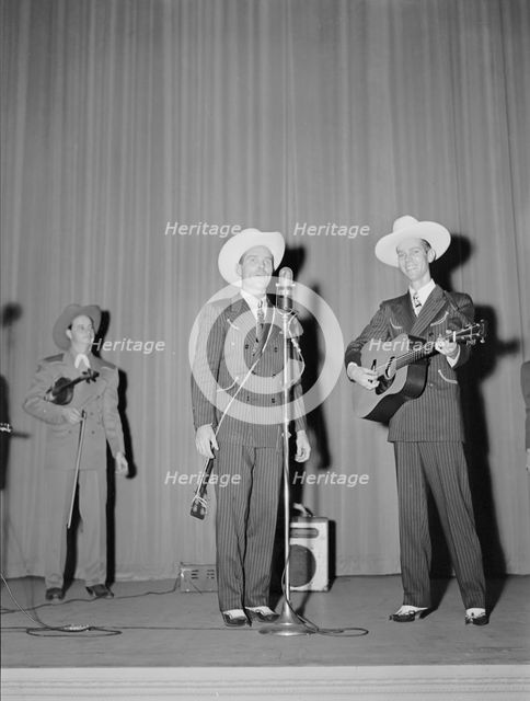 Portrait of Ernest Tubb concert, Carnegie Hall, New York, N.Y., Sept. 18-19, 1947. Creator: William Paul Gottlieb.