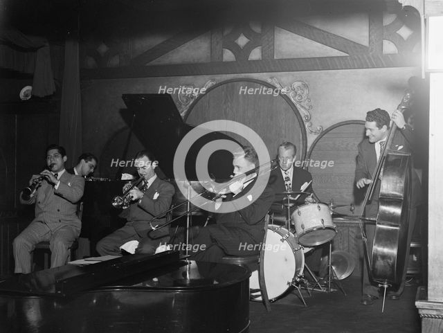 Portrait of Ernie Caceres, Bobby Hackett, Freddie Ohms, and George Wettling, Nick's..., N.Y., 1946. Creator: William Paul Gottlieb.