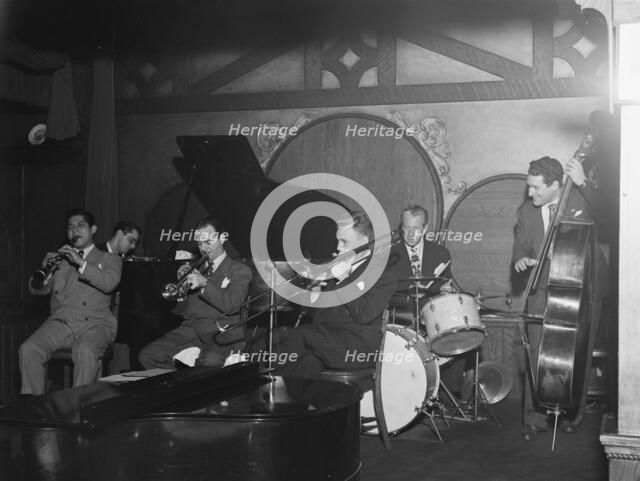 Portrait of Ernie Caceres, Bobby Hackett, Freddie Ohms, and George Wettling, Nick's..., N.Y., 1946. Creator: William Paul Gottlieb.