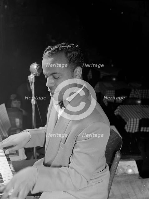 Portrait of Erskine Butterfield, Brown Derby(?), Washington, D.C., ca. Mar. 1942. Creator: William Paul Gottlieb.