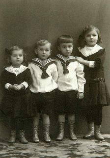 Portrait of four children, 1910s. Artist: Georgi Vasilievich Trunov