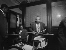 Portrait of Freddie Moore and Joe Thomas...Gottlieb's office party, Jamaica, Queens, N.Y., ca.1948. Creator: William Paul Gottlieb