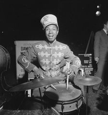 Portrait of Kaiser Marshall, Times Square(?), New York, N.Y., ca. July 1947. Creator: William Paul Gottlieb