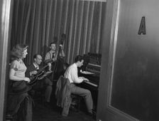 Portrait of Helen Carr, Sammy Herman, Joe Bianco, and Donn Trenner, Nola's, N.Y., ca. Feb. 1947. Creator: William Paul Gottlieb