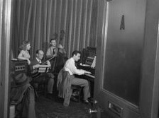 Portrait of Helen Carr, Sammy Herman, Joe Bianco, and Donn Trenner, Nola's, N.Y., ca. Feb. 1947. Creator: William Paul Gottlieb