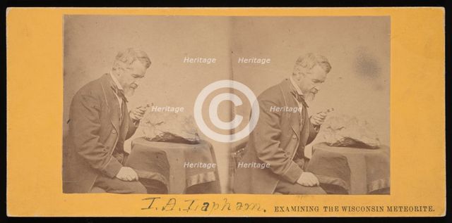 Portrait of Increase Allen Lapham (1811-1875) - Examining the Wisconsin Meteorite, Circa 1868. Creator: Hugo Broich.