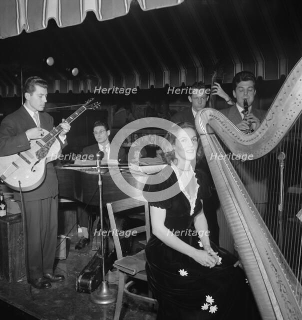 Portrait of Joe Marsala and Adele Girard, Hickory House, New York, N.Y., 1946. Creator: William Paul Gottlieb.