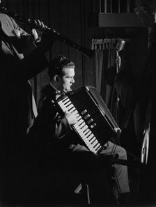 Portrait of Joe Mooney and Andy Fitzgerald, Eddie Condon's, New York, N.Y., ca. June 1947. Creator: William Paul Gottlieb