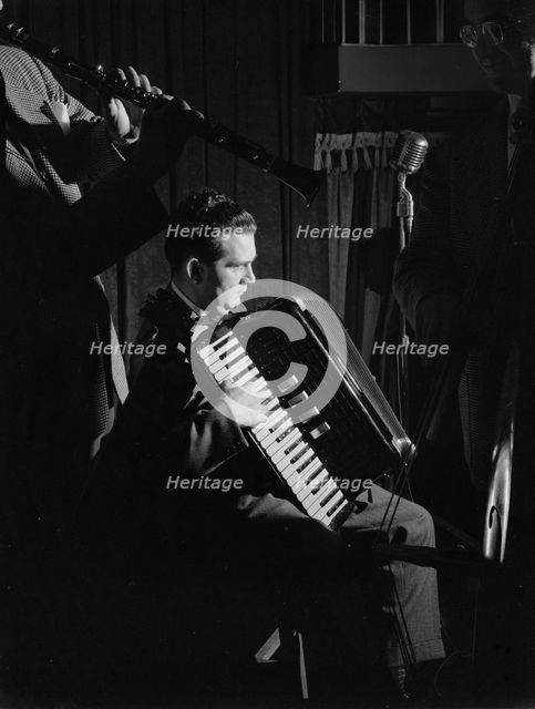 Portrait of Joe Mooney and Andy Fitzgerald, Eddie Condon's, New York, N.Y., ca. June 1947. Creator: William Paul Gottlieb.