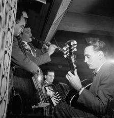 Portrait of Joe Mooney, Andy Fitzgerald, Gaeton (Gate) Frega..., Dixon's Steak House(?), N.Y., c1946 Creator: William Paul Gottlieb