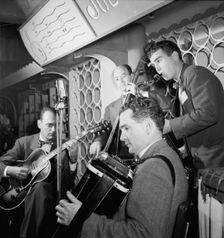 Portrait of Joe Mooney, Gaeton (Gate) Frega, and Andy Fitzgerald, Dixon's Steak House(?), N.Y., 1946 Creator: William Paul Gottlieb