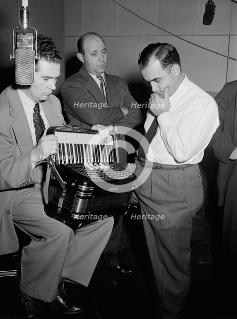 Portrait of Joe Mooney, Milt Gabler, and Morty Palitz, Decca studio, New York, N.Y., ca. Dec. 1946. Creator: William Paul Gottlieb.