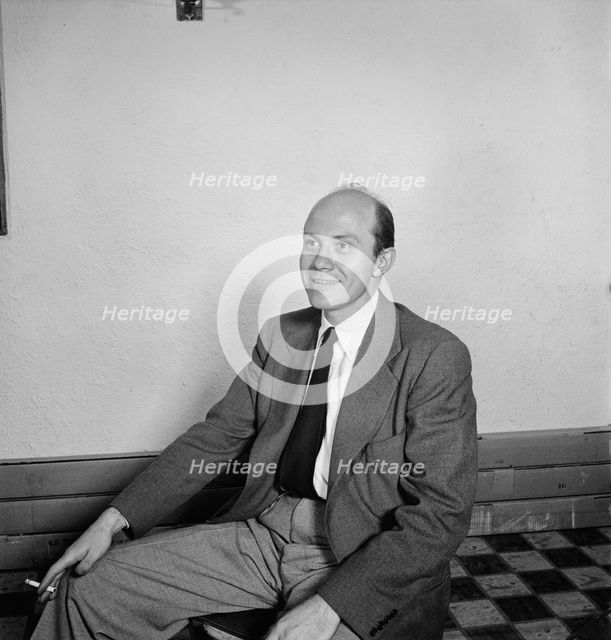 Portrait of John S. Wilson, New York, N.Y.(?), 1938. Creator: William Paul Gottlieb.